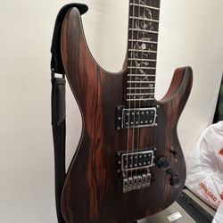 **Schecter EXOTIC EBONY C-1** (TRADES WELCOMED)
