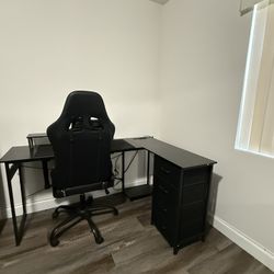 PC desk with a gaming chair