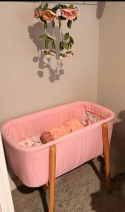 LIKE NEW PORTABLE PINK BABY BASSINET!