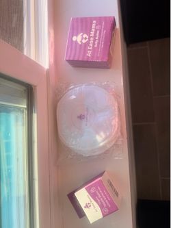 A ease mama nipple balm, belly butter and nursing pads