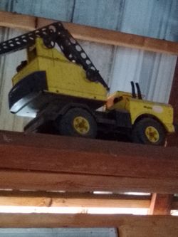 collection of Vintage tonkas all metal large Yellow Toy Dump Truck with Crane