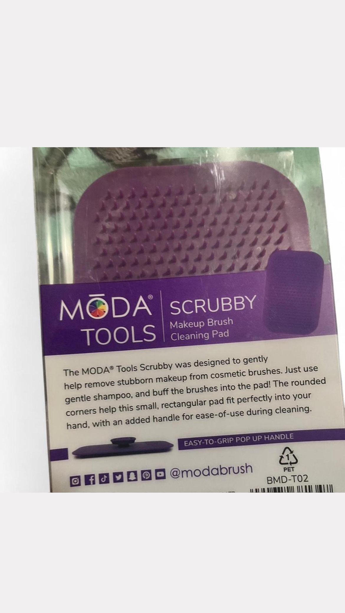 Purple Makeup Brush Cleaner.