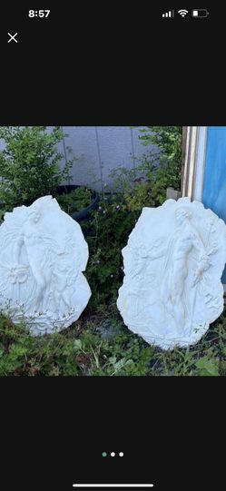 Wall Sculptures With Romanesque Lovers