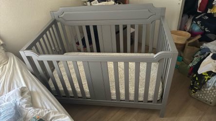 Baby crib with mattress