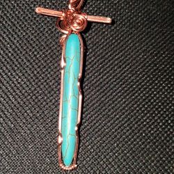 Turquoise sword pendant