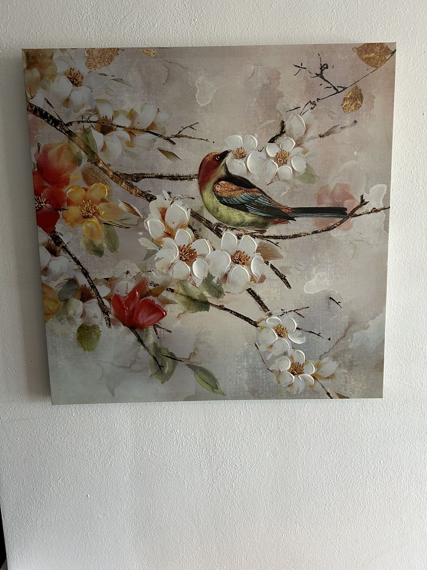 Wall Art Featuring A Blue Colored Bird With Flowers