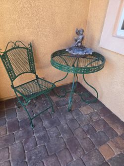 Little metal table round with fold up metal chair, perfect