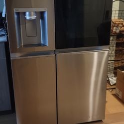 Moving. LG Side By Side Refrigerator 