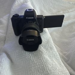 Canon E05 M50 