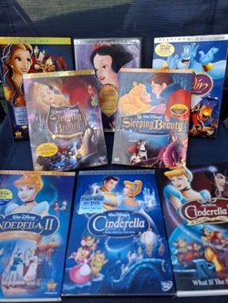 Vintage Disney dvds and basket excellent condition