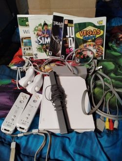 White Wii console with games, $125
