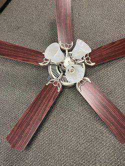New in box. 52" Indoor Ceiling Fan with 5 Reversible Blades and 3 Light.
