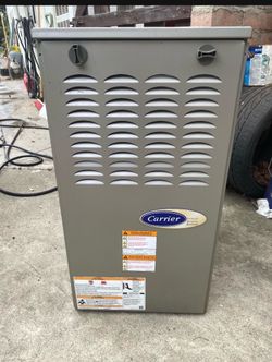 CARRIER central air furnace (like new)