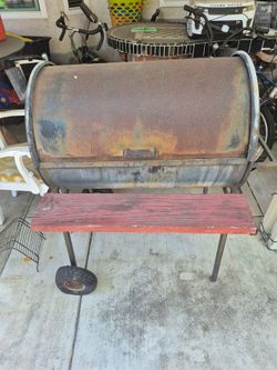 Old school borrow BBQ pit need new tires $100