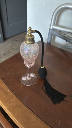 Envase de perfume  colecion. $10