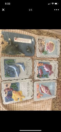 Hanging sea fish’s, dolphin,shells,turtle