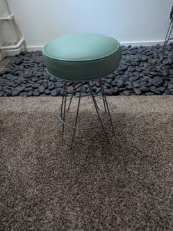 Vintage turquoise vinyl covered (padded) stool - $25 (Downtown) NON-NEGOTIABLE.