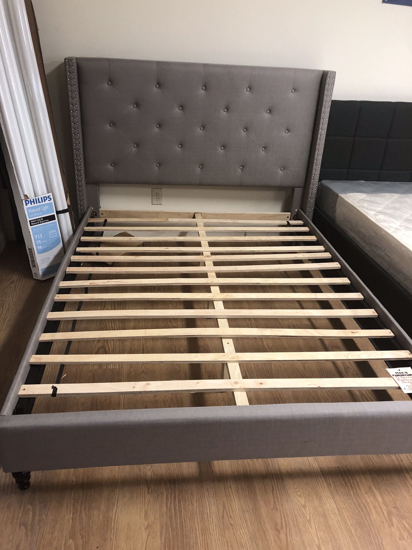 New queen bed frame in box