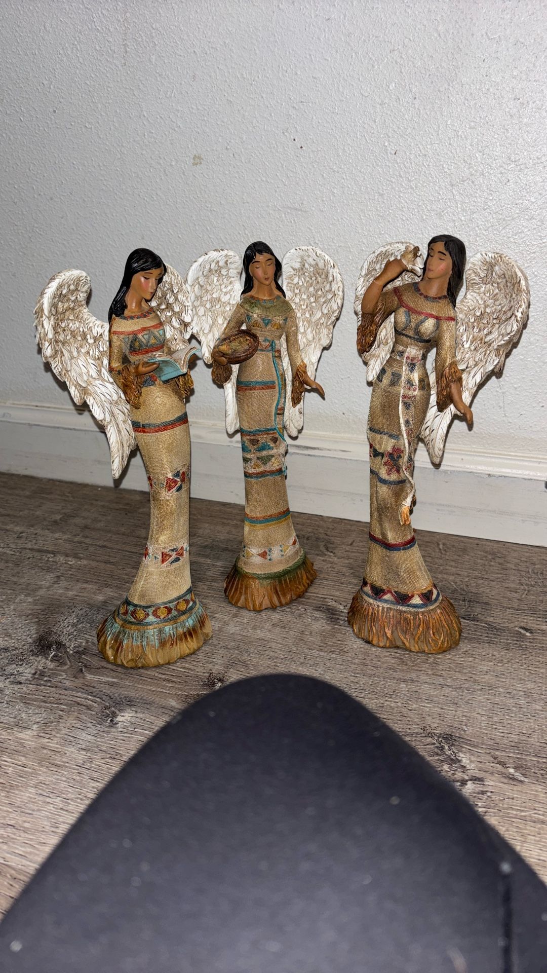 set of three Ebros Gift Native American female angel figurines holding a Bible, dove, and basket