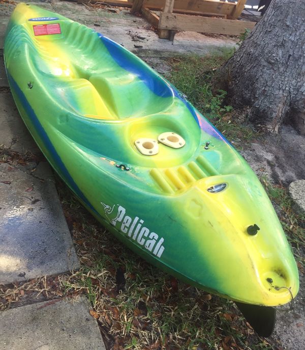 Ocean Kayak by Pelican, 9 foot length. 2 Fishing pole, Cooler, drink