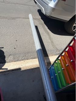 Rv roller awning bar approximately 15 ft 8 in’s and brand new awning tarp