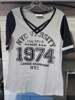 Women's Jersey Style Top $4 each (One Available In Size Small and One Available In Size Large)