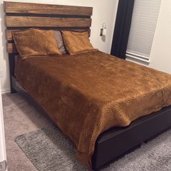 Wood Queen bed. Headboard, Footboard, Wood Slats. Mattress/boxspring Not Included
