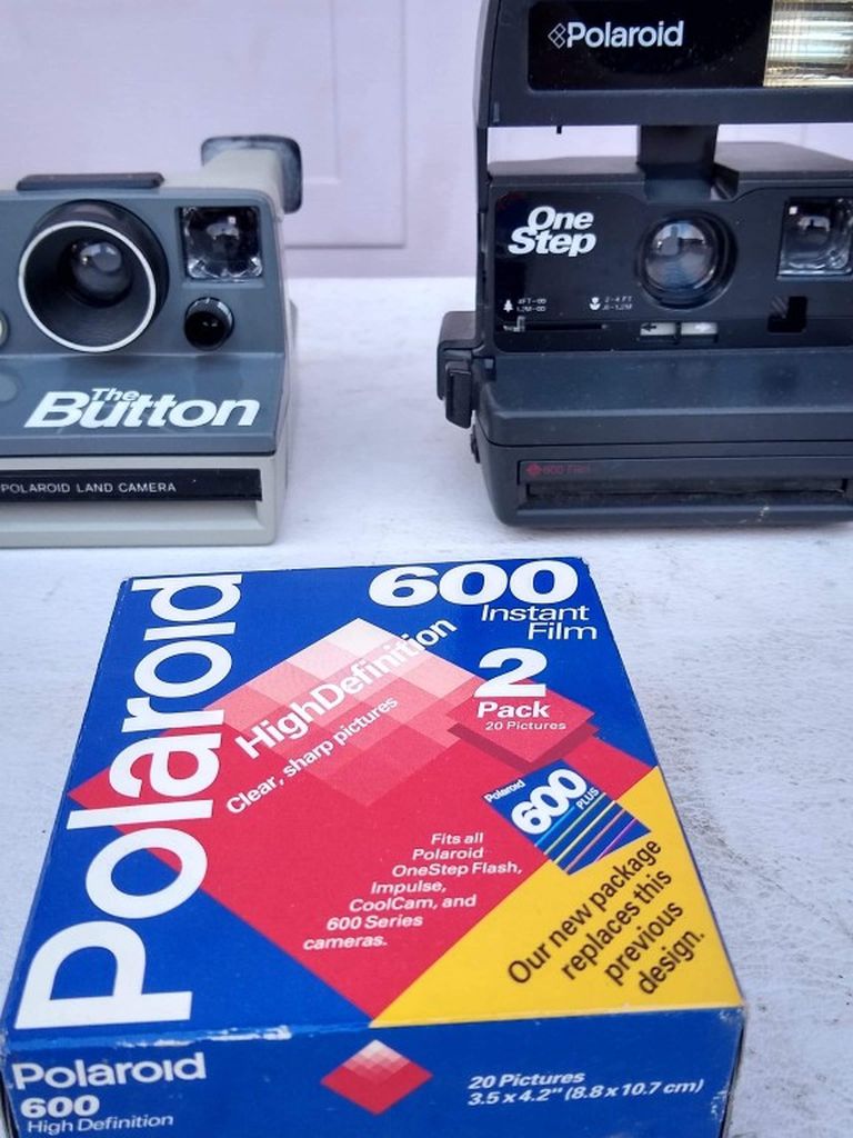 2 Polaroid Cameras And Film