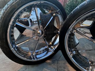 4 22” rims chrome with 3 good tires