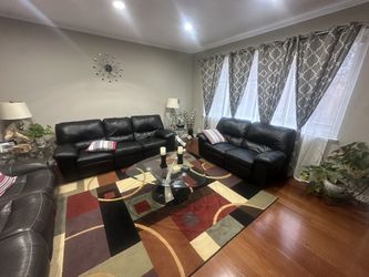 2 Black Leather Couch’s