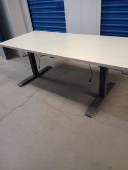 71  1/2 by 29 1/2 Electric Sit And Stand Ergonomic Desk