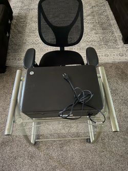 1 glass/metal computer desk, 1 computer chair and 1 hp printer/copier