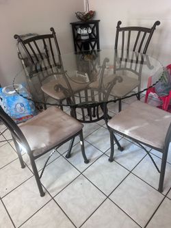 $75 obo dining table and chairs