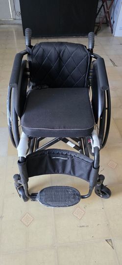 Wheelchair ,selling a brand new, never-used ultra-lightweight active sports wheelchair in sleek matte black. It still has all the original factory pro