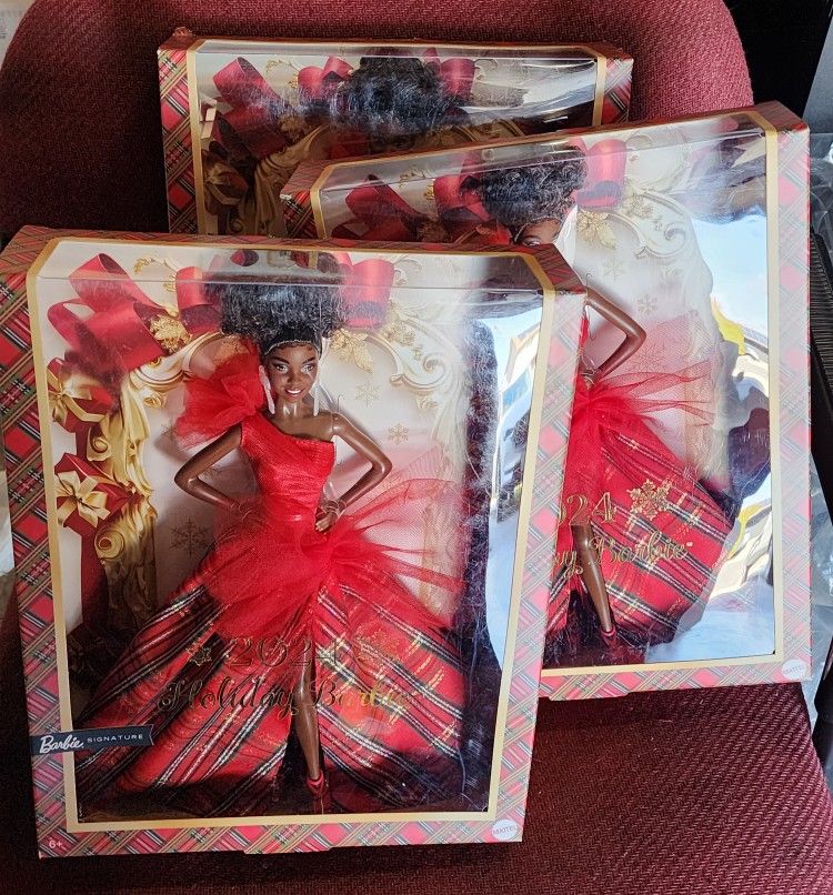 3 Holiday Barbie Dolls