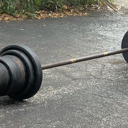 6 FOOT BARBELL BAR  & 145 LBS. OF OLYMPIC PLATES (PAIRS OF ) :  22s  &  11s  & (TEN)  5.5s  &  (TEN)  2.75s
