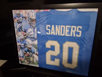 BARRY SANDERS HALL OF FAMER WITH THE DETROIT LIONS STITCHED, FRAMED JERSEY.