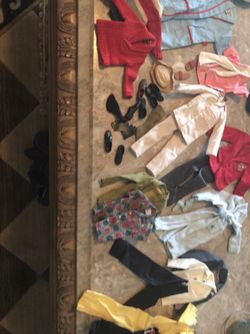 Barbie and ken clothes and case $275