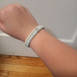 A Set Of Two Beachy Blue Bracelets One Pearl And One Clay Beads