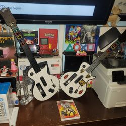 2 Nintendo Wii Guitar Hero Guitars With Game