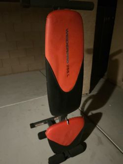 Adjustable folding weight bench