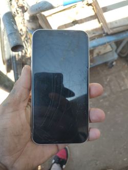 White iphone 12 for parts screen barley works