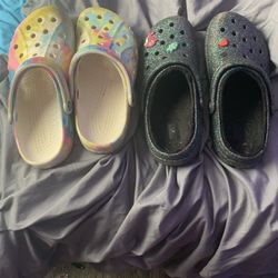 2 Pairs Of Crocs, One Comes With Three Croc Charms CASH ONLY