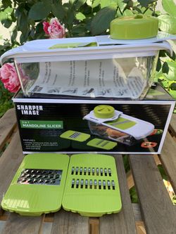 Brand new mandolin slicer / grater and julienne slicer