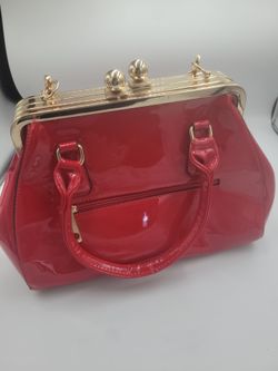 Red women's handbag.