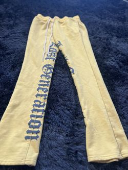 Yellow stacked sweats .