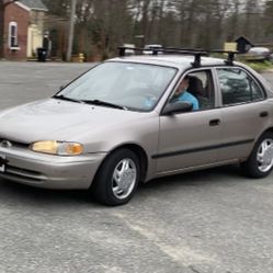 2000 Chevy Prizm. Drivable - Too Costly To Fix To Get Inspection 