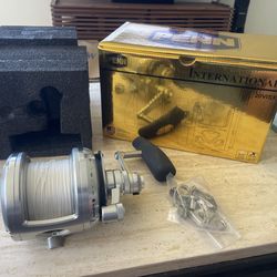 Penn International 20 VISX fishing reel  never used, with spectra