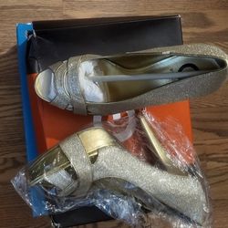 Size 9 Guess High Heels. NEW in box. Never Worn. Still in original tissue & bo.
