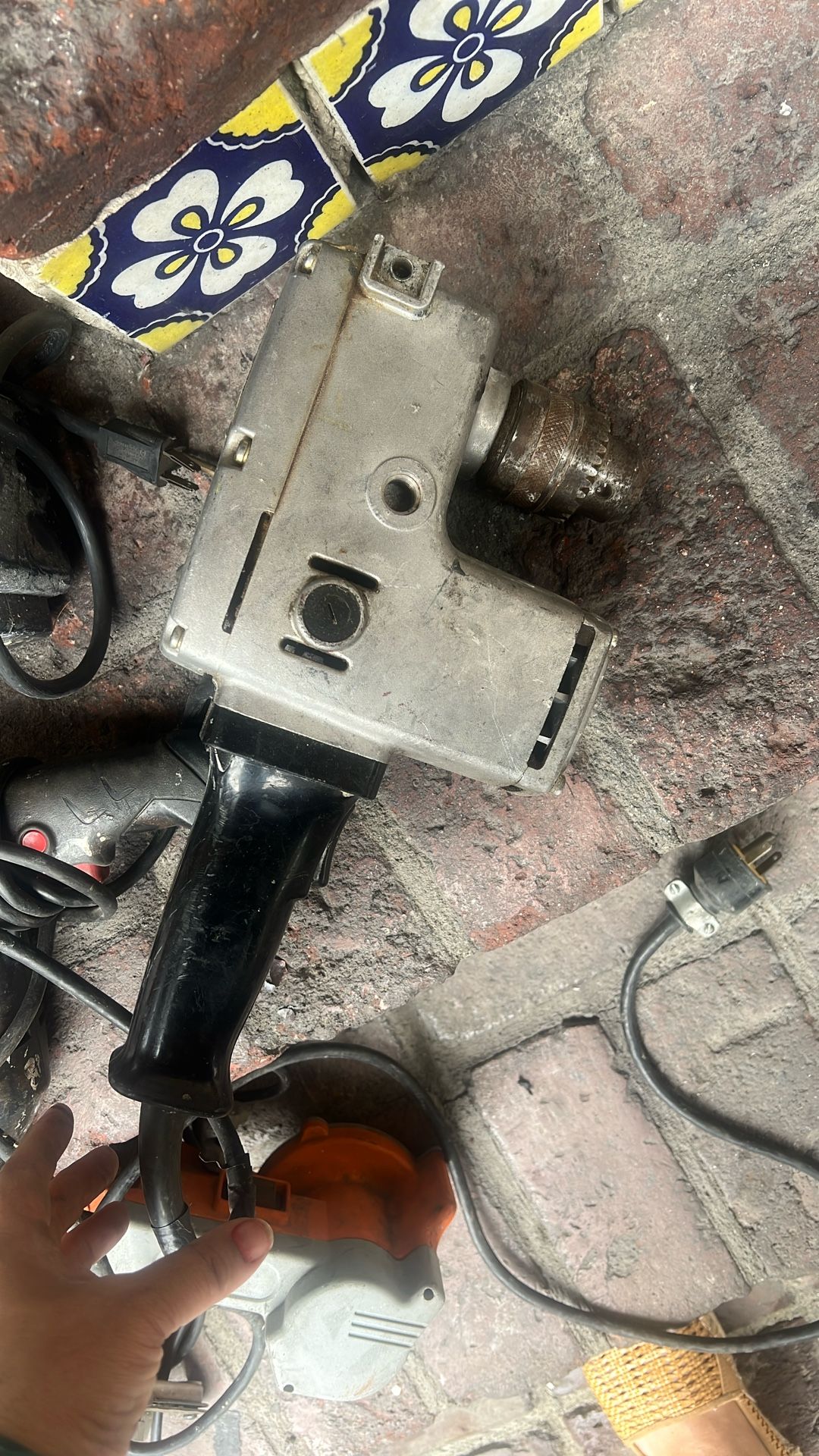 Makita 13mm (1/2") Angle Drill, Model DA4511. This is a powerful, corded power tool designed for drilling in confined, hard-to-reach places.  